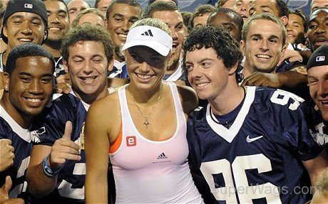 Caroline Wozniacki And Rory McIlroy With Team