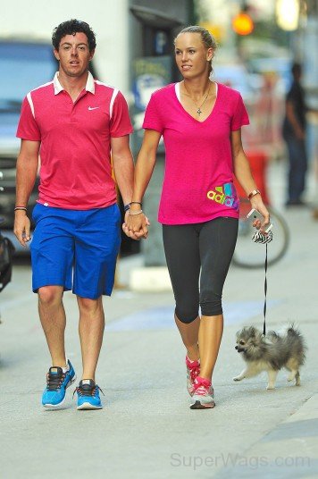 Rory Mcilroy and Caroline Wearing Pink T-Shirt