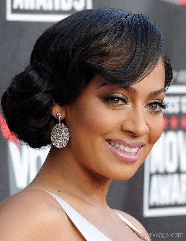 La La Anthony Side Bun Hairstyle