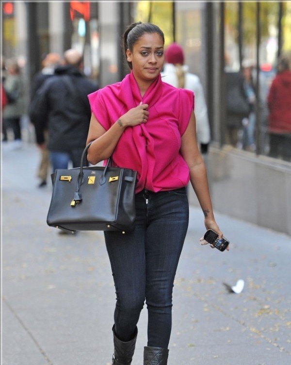 La La Anthony Wearing Red Top And Black Jeans